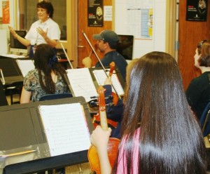 Centre Strings will hold its first rehearsal of the year on Tuesday, September 13,6:30 p.m. to 7:45 p.m., Lyn Schenbeck, above, in background, directs the community orchestra, and invites local concert strings musicians to join for the group's 10th anniversary season.
