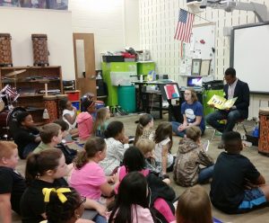 Newnan High School students Maddie Ellsworth and Trey Herring read “The Bear Ate Your Sandwich” at Atkinson Elementary School, as a part of Thursday’s Read for the Record event. 